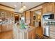 A chef's kitchen with granite countertops, stainless steel appliances, custom cabinetry, and a convenient center island at 2834 Parkers Landing Rd, Mount Pleasant, SC 29466