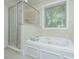 Bright bathroom with a jetted tub and separate shower at 3005 Macbeth Creek Dr, Charleston, SC 29414