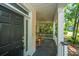 Charming front porch with rocking chairs, perfect for enjoying the outdoors at 3005 Macbeth Creek Dr, Charleston, SC 29414