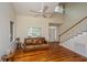 Bright living room featuring hardwood floors, high ceilings, and natural light at 3005 Macbeth Creek Dr, Charleston, SC 29414
