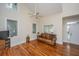 Bright living room featuring hardwood floors, high ceilings, and natural light at 3005 Macbeth Creek Dr, Charleston, SC 29414