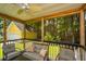 Enjoy the outdoors on this screened-in porch with overhead fan at 3005 Macbeth Creek Dr, Charleston, SC 29414