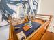 Stylish bar cart featuring liquor bottles, glasses, and a cocktail set, perfect for entertaining guests at home at 4 Beaufain St # 207, Charleston, SC 29401