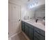 Bathroom featuring updated vanity with quartz countertop and chrome fixtures at 4 Beaufain St # 207, Charleston, SC 29401