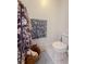 Bathroom with updated toilet and decorative towels at 4 Beaufain St # 207, Charleston, SC 29401