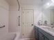 Bathroom showcasing white subway tile shower and updated vanity with quartz countertop at 4 Beaufain St # 207, Charleston, SC 29401