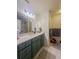 Bathroom featuring updated vanity with quartz countertop and chrome fixtures at 4 Beaufain St # 207, Charleston, SC 29401