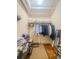 Walk-in closet with organized storage and shelving at 4 Beaufain St # 207, Charleston, SC 29401
