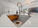 Close-up of a kitchen sink with a unique design and modern fixtures at 4 Beaufain St # 207, Charleston, SC 29401