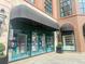 Upscale storefront featuring a black awning and window displays of handbags at 4 Beaufain St # 207, Charleston, SC 29401