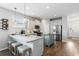 Modern kitchen featuring stainless steel appliances, granite countertops, and a functional center island at 411 Topcrest Ln, Moncks Corner, SC 29461