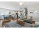 Cozy open-concept living room and dining area with hardwood floors at 411 Topcrest Ln, Moncks Corner, SC 29461