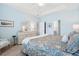 Relaxing bedroom with a tray ceiling, side tables, and natural lighting at 411 Topcrest Ln, Moncks Corner, SC 29461