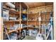Organized shed filled with shelves and various items, providing ample storage space for tools and equipment at 411 Topcrest Ln, Moncks Corner, SC 29461