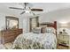 Cozy bedroom with wood-look floors, a ceiling fan, and nature-themed accents at 414 Birch Ave, Goose Creek, SC 29445