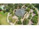 Aerial view of community clubhouse featuring green surroundings and an adjacent golf course at 4272 Persimmon Woods Dr, Charleston, SC 29420