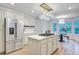 Bright kitchen with stainless steel appliances, light fixtures, and a center island with a gas cooktop at 4272 Persimmon Woods Dr, Charleston, SC 29420