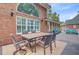 Outdoor patio with seating, perfect for dining and relaxing with a view of the house at 4272 Persimmon Woods Dr, Charleston, SC 29420