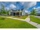 Charming two-story home with well-manicured lawn and sidewalk at 436 Ripple Park Dr, Summerville, SC 29486