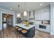 Modern kitchen featuring a central island, stainless steel appliances, and ample cabinet space at 436 Ripple Park Dr, Summerville, SC 29486