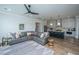 Open-concept living room and kitchen area, perfect for entertaining, featuring hardwood floors and recessed lighting at 436 Ripple Park Dr, Summerville, SC 29486