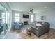 Bright living room with hardwood floors, fireplace, ceiling fan, and comfortable seating at 436 Ripple Park Dr, Summerville, SC 29486