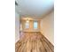 Spacious living room with laminate flooring and natural light streaming through the windows at 4816 Cane Pole Ln, Summerville, SC 29485