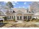 Charming home featuring symmetrical architecture, with a well-manicured lawn and inviting entryway at 4850 Habersham Ln, Summerville, SC 29485