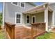 A beautiful back deck featuring wood floors and wood railing offers great space for outdoor living at 5242 E Dolphin St, North Charleston, SC 29405