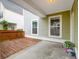 This spacious, covered back patio has plenty of room for entertaining at 5242 E Dolphin St, North Charleston, SC 29405