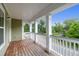 This home features a balcony with white columns, wooden floors and great views of the neighborhood at 5242 E Dolphin St, North Charleston, SC 29405