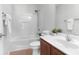 Bathroom featuring a tub and shower combination and a vanity with solid surface countertop at 5242 E Dolphin St, North Charleston, SC 29405