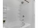 Bathroom showcasing a white bathtub with a tile surround and shower head at 5242 E Dolphin St, North Charleston, SC 29405