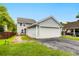 Detached garage with ample parking space and rear yard access at 5242 E Dolphin St, North Charleston, SC 29405