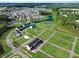 Sprawling community with lush landscaping, ponds, and modern townhomes at 568 Scholar Way, Summerville, SC 29486