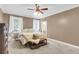 Bedroom with neutral colored walls, carpet flooring, ceiling fan and natural light at 591 Two Mile, Johns Island, SC 29455