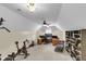 Bonus room with ceiling fan, chaise lounge, exercise equipment, built-in shelves and a desk with computer at 591 Two Mile, Johns Island, SC 29455