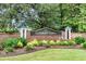 Community entrance sign for Grimball Gates, featuring brick accents, lush landscaping, and a welcoming atmosphere at 591 Two Mile, Johns Island, SC 29455