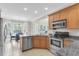 Bright kitchen with stainless steel appliances, tile flooring and eat-in breakfast nook at 591 Two Mile, Johns Island, SC 29455