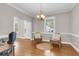 Bright living room featuring hardwood floors, natural light, and comfortable seating, perfect for relaxing or entertaining at 591 Two Mile, Johns Island, SC 29455