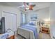 Charming bedroom with a ceiling fan, light blue accents, and closet at 605 Grassy Hill Rd, Summerville, SC 29483