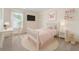 Cozy bedroom featuring plush carpeting, natural light and a ceiling fan at 708 Professor Dr, Ladson, SC 29456