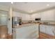 Functional kitchen offers ample counter space, stainless steel appliances, and bright white cabinets at 708 Professor Dr, Ladson, SC 29456