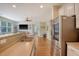 Kitchen area with stainless steel appliances, white cabinets, and countertop for preparing meals at 708 Professor Dr, Ladson, SC 29456