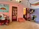Whimsical bedroom with colorful decor, a variety of plush toys, and ample space for play, creating a fun environment at 8 Brisbane Dr, Charleston, SC 29407