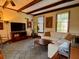 Inviting living room with exposed beam ceiling and comfortable seating at 8 Brisbane Dr, Charleston, SC 29407