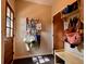 Mud room featuring wood-look tile floors, storage bench, and hanging storage at 8 Brisbane Dr, Charleston, SC 29407