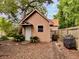 Backyard shed with mature landscaping and a barbecue grill at 8 Brisbane Dr, Charleston, SC 29407