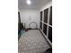 Bonus room features a large rug and windows, ideal for a workout or hobby space at 806 Greenmeadow Dr, Goose Creek, SC 29445