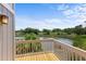 Relaxing balcony view overlooking a serene pond and lush green golf course at 811 Treeloft Trce, Seabrook Island, SC 29455